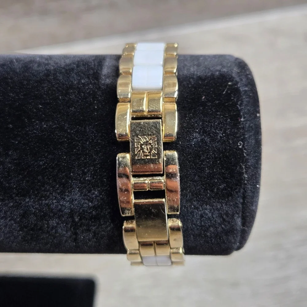 Anne Klein Women's 10/9537MPTTT Mother of Pearl Dial White?Gold Tone Band Watch